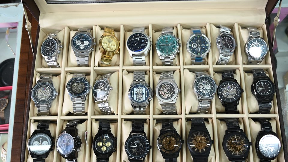 A case of men's watches at Munna Electronics