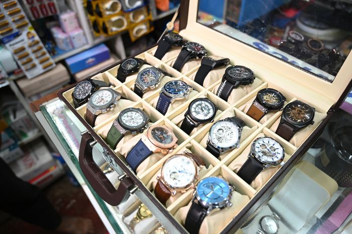 A case of chronograph and skeleton-dial watches
